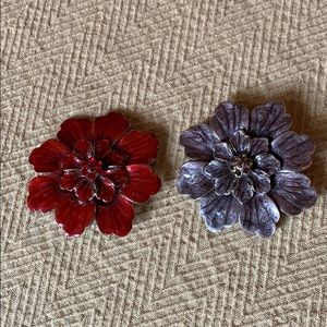 Two enameled flower pendants